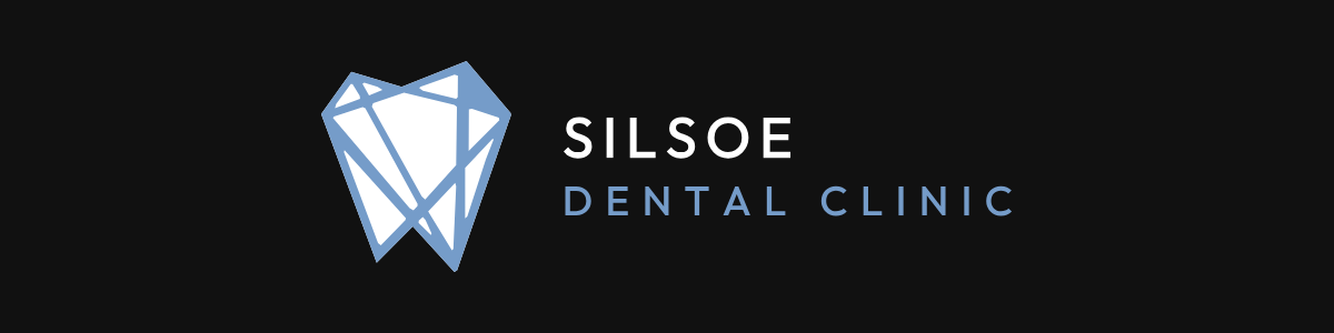 The Silsoe Dental Clinic logo, white on dark